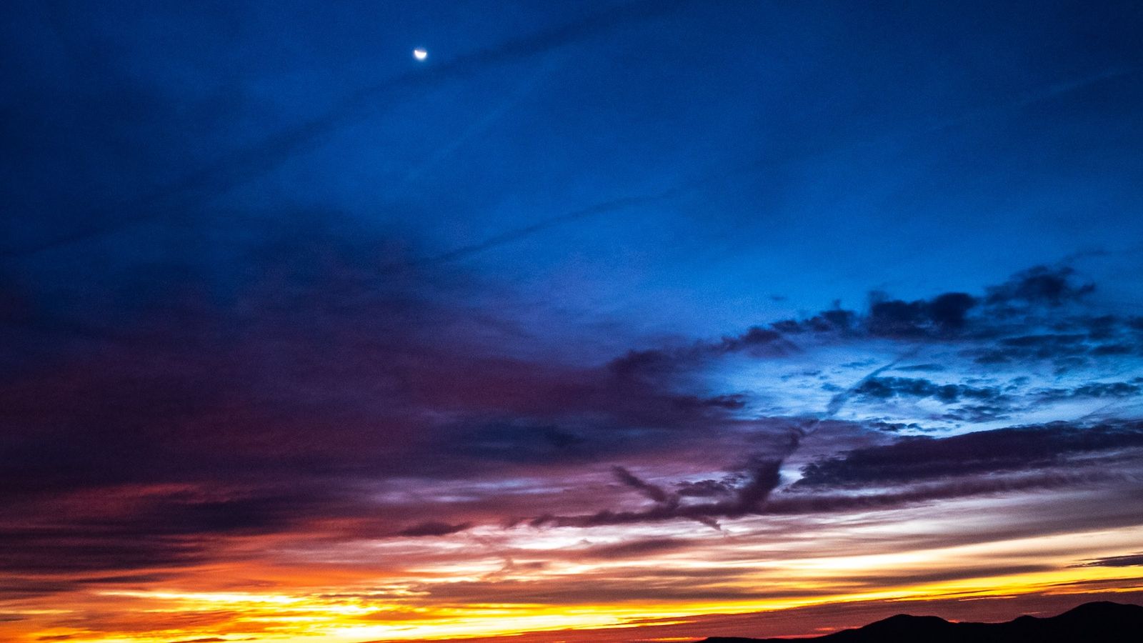 On duty: deep blue twilight with streaks of colorful cloud.